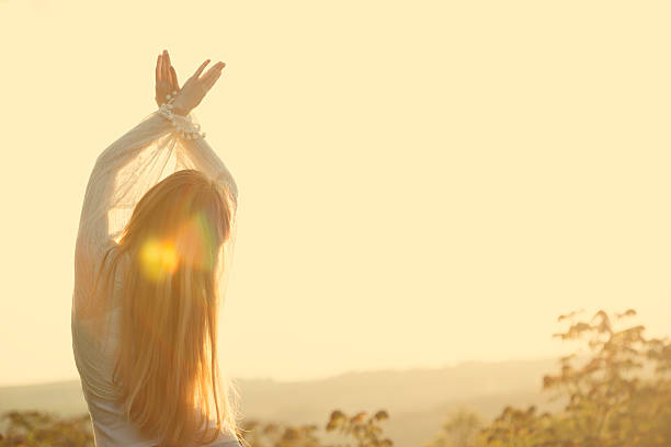 istock Young woman and sunbeams 475645882