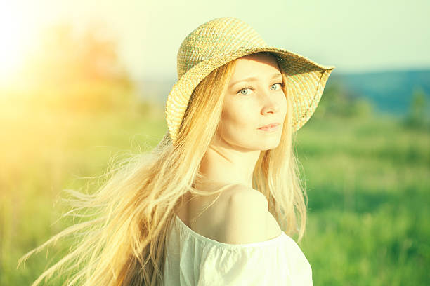 istock Young woman and sunbeams 475645894