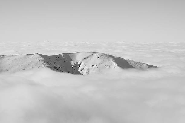 Mountain in clouds stock photo