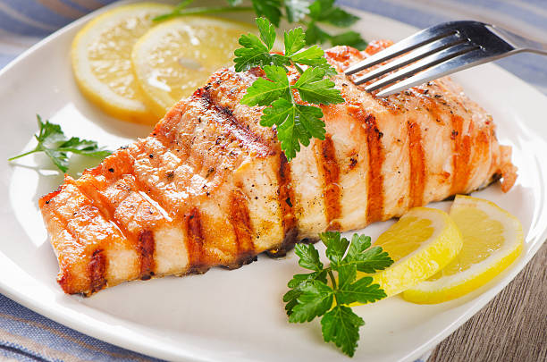 istock Grilled Salmon with lemon and   herbs 475650904