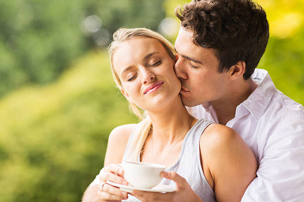 istock husband kissing wife 475653688