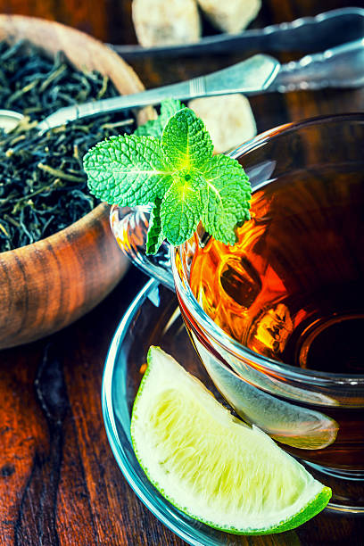 istock Tea in a glass cup, mint leaves 475654000
