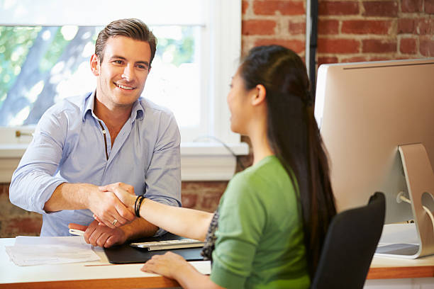 istock Businessman interviews female job applicant 475658267