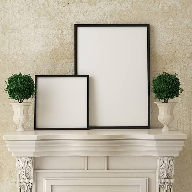 istock mock up poster frames on the vintage fireplace, interior background 475659760