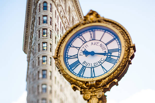 istock Flatiron and 5th Avenue Building clock in New York City 475661184