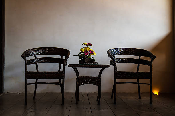istock Chair in a dark room 475665541