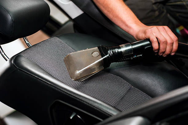 istock Auto car service cleaning the drivers seat, cleaning 475667451