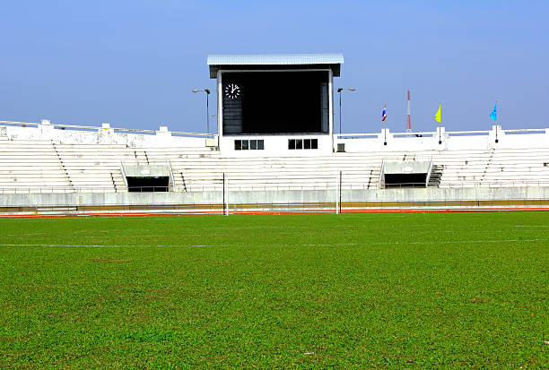 istock football field with score board 475667839
