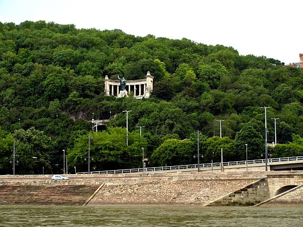 Statue of St. Gellert , Budapest ,  Hungaryhttps://lh4.googleusercontent.com/-tkto1p7JLvs/U0GIka2lRBI/AAAAAAAAA34/tiVEL_Pi5aQ/w380-h200-no/banner_Budapest.png