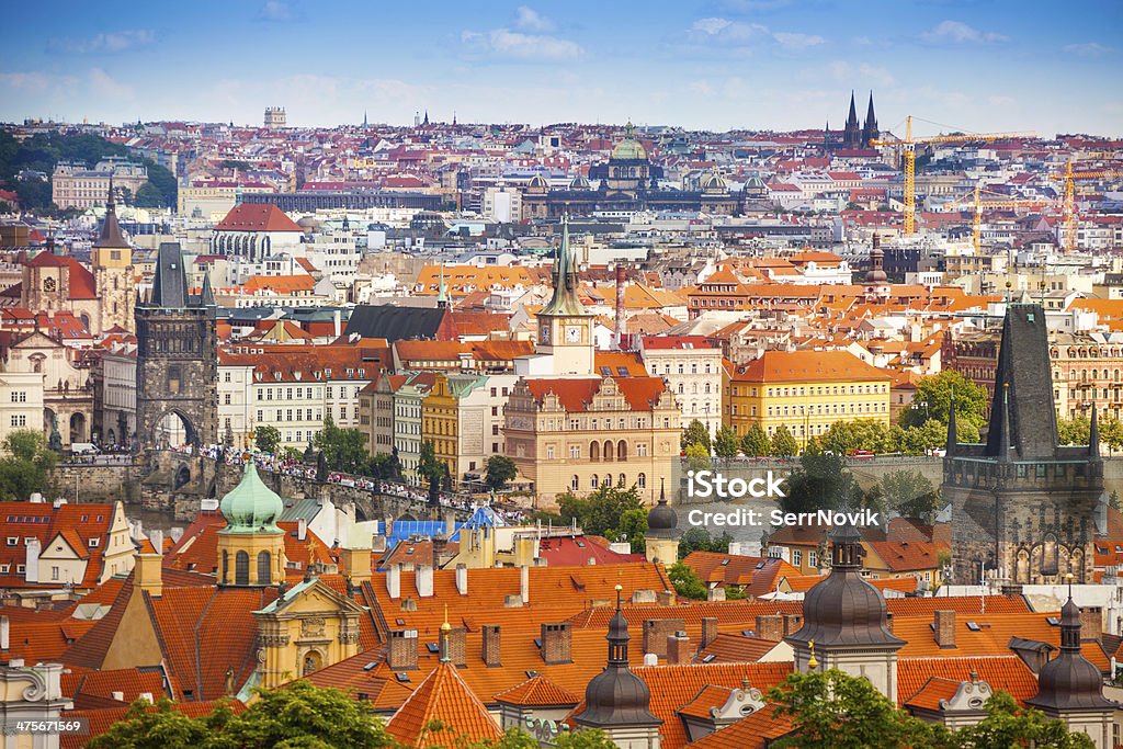 Prague downtown panorama Panoraa of Prague downtown with red roofs and Charles bridge towers Aerial View Stock Photo