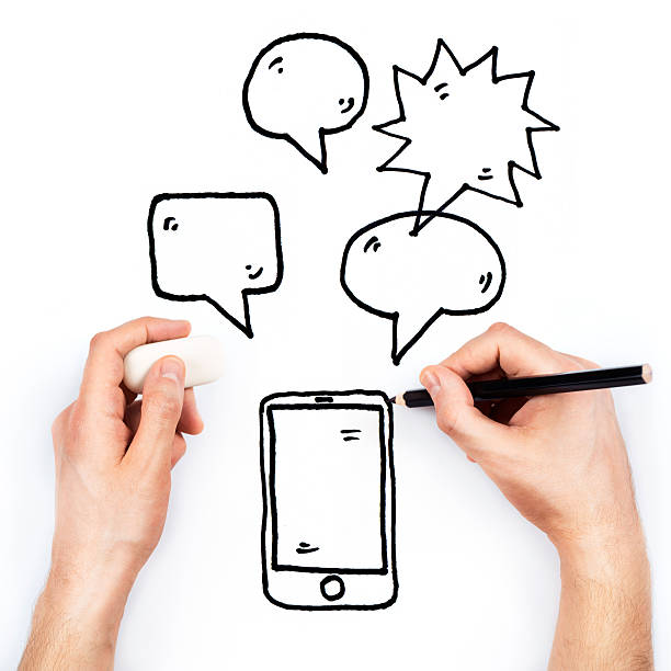 istock Man's hand draws phone and messages on white 475673897