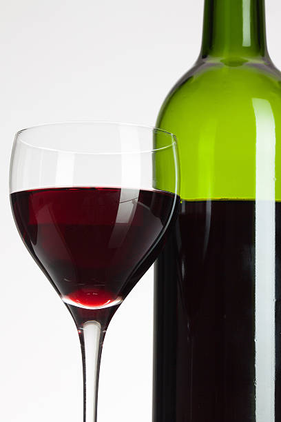 istock Glass and bottle with red wine 475675384
