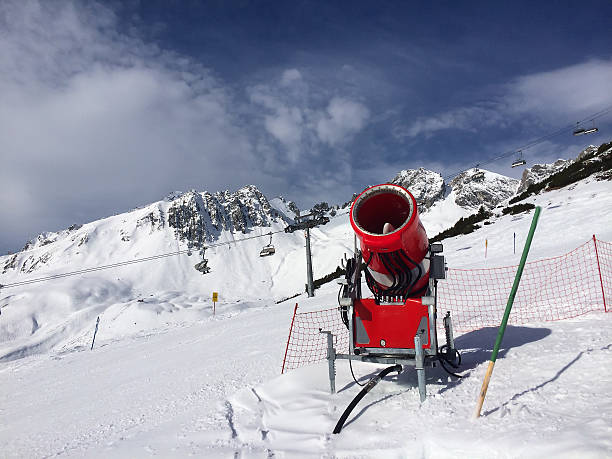 istock Modern red snow cannon in sunny day 475675470