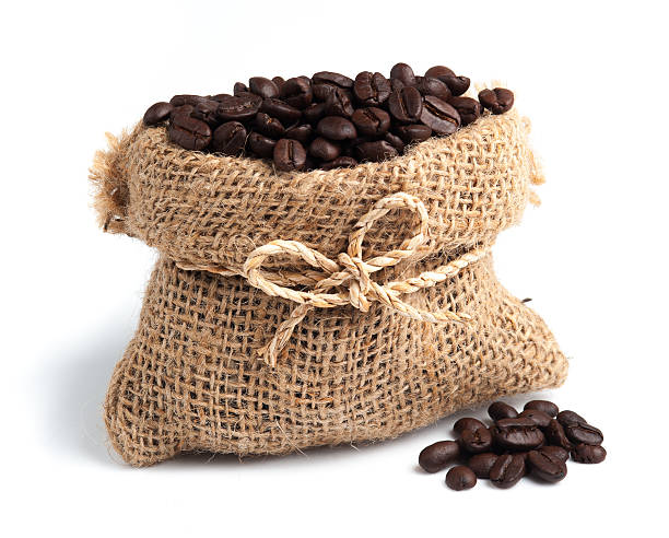 istock Coffee beans in canvas sack on white background 475675952