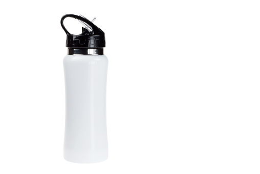White and stylish isolated stainless steel bottle on white background.  Also there is a big copy space.