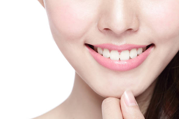 istock young woman health teeth 475682040