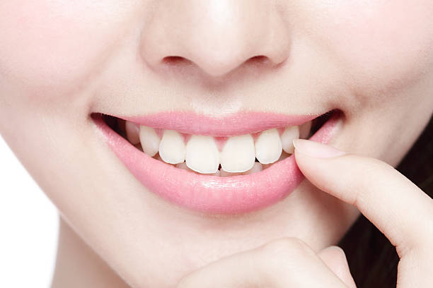 istock young woman health teeth 475682056