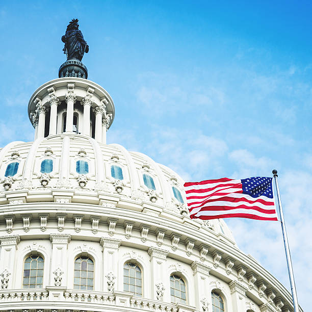 istock washintgton dc with us flag waving 475683909