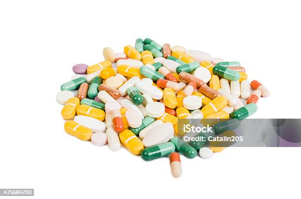 Group Of Many Colored Pills Isolated Stock Photo - Download Image Now - 2015, Addiction, Antibiotic