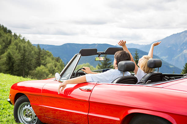 istock Happy couple with cabriolet 475685983
