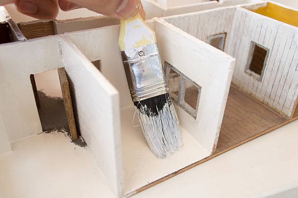 istock painting the marquetry model house 475687952