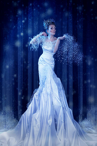 istock Snow Queen in the forest creates a blizzard 475689599