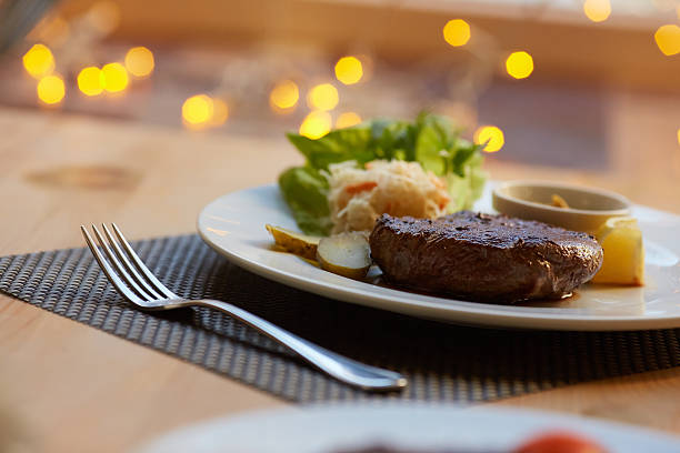 istock steak with sauce and vegetables 475689940