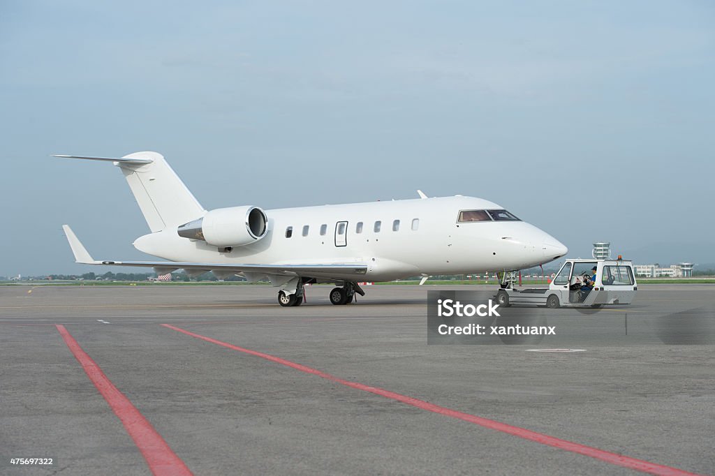 Business jet airplane on the ground Private Airplane Stock Photo