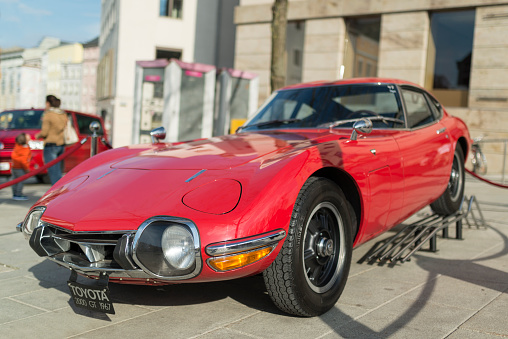Passau, Germany - April 12, 2015: Public Car presentation in the old town of Passau, Bavaria. The Toyota 2000GT was a sports car from the Japanese automaker Toyota. This car is a model from the year 1967. The model treats of today's automotive collectors at very high prices, since only 351 units of the vehicle were produced.