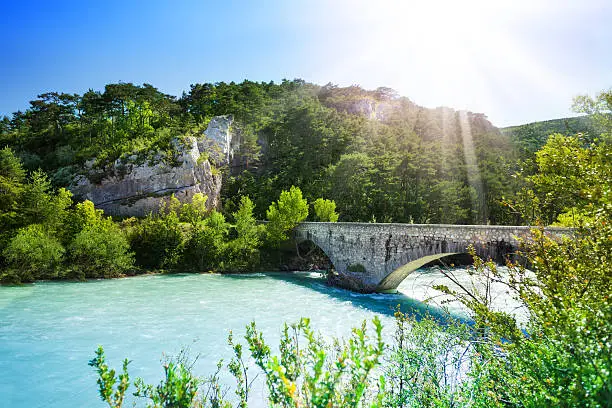 Bridge over Le Verdon river in south French Alps mountains