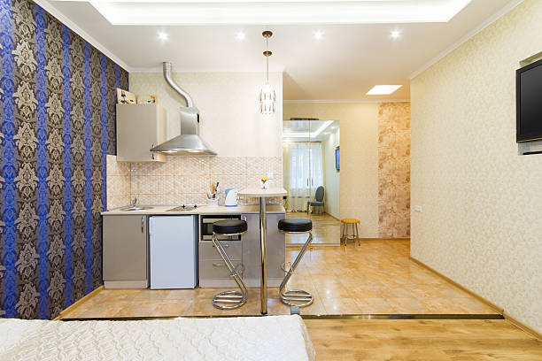 istock Modern Studio Apartment. Kitchen and living room 475700304