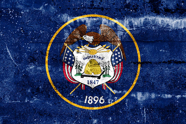 istock Utah State Flag painted on grunge wall 475701285