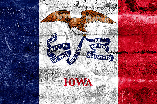 istock Iowa State Flag painted on grunge wall 475701289