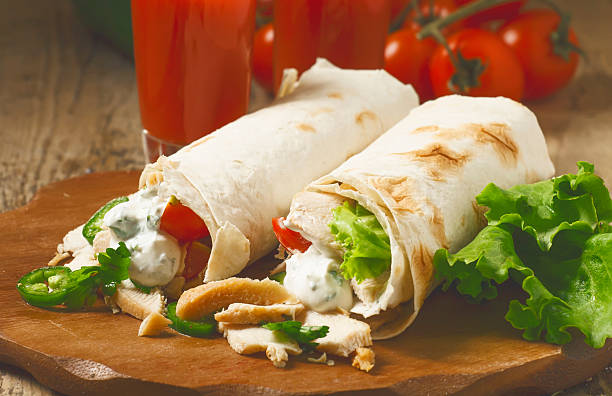 istock Turkish doner kebab, shawarma, roll with meat and pita bread 475704678