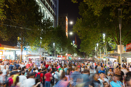 Melbourne, Australia - February 21, 2015 - Melbourne's famous Swanston St with large crowd at White Night celebration.