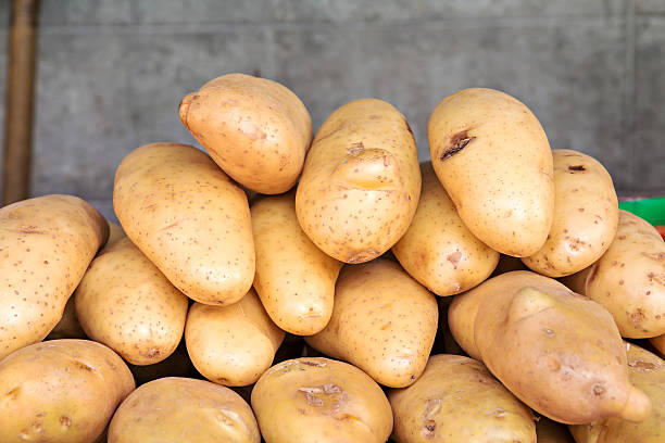 istock Fresh potatoes sold on market 475705772