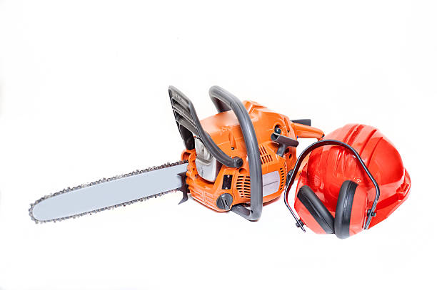 istock mechanical gasoline powered chainsaw with protective gear 475707279