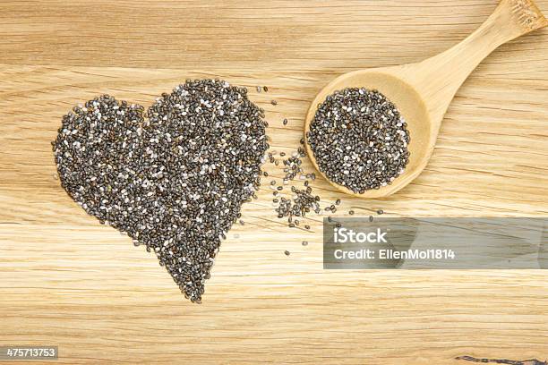 Heart Symbol Made Of Black Chia Seeds And Spoon Stock Photo - Download Image Now - Antioxidant, Backgrounds, Black Color