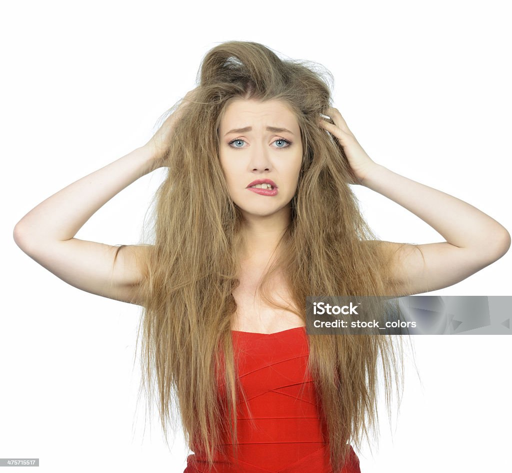 panic blond hair woman with bad hair day making a face. 20-24 Years Stock Photo