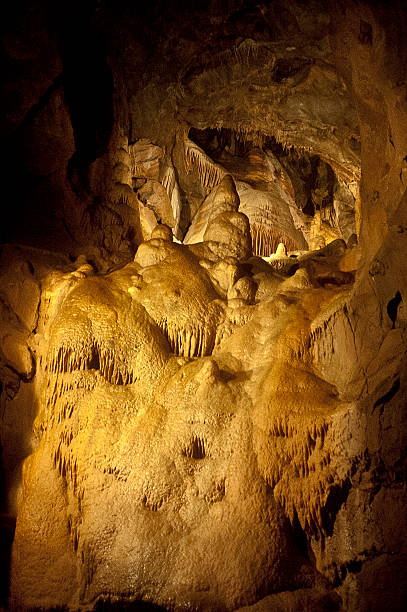 Cheddar Gorge Caves Cheddar Gorge, Cave, Underground, Stalactite, Reflection, Overcast, Limestone, Stalagmite cheddar gorge stock pictures, royalty-free photos & images