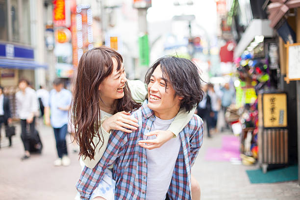 istock Young asian couple having fun 475719402
