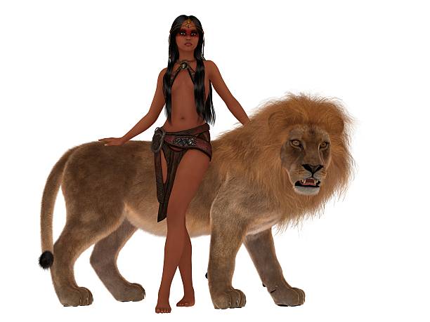Exotic dark skinned female in skimpy leather outfit standing with pet lion
