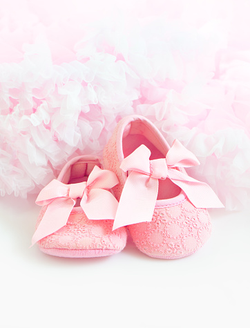 Pair of pink bootees close-up