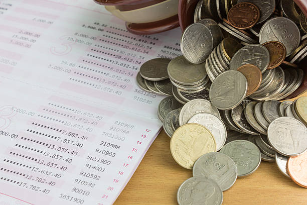 istock pile of  coins with passbook 475723608