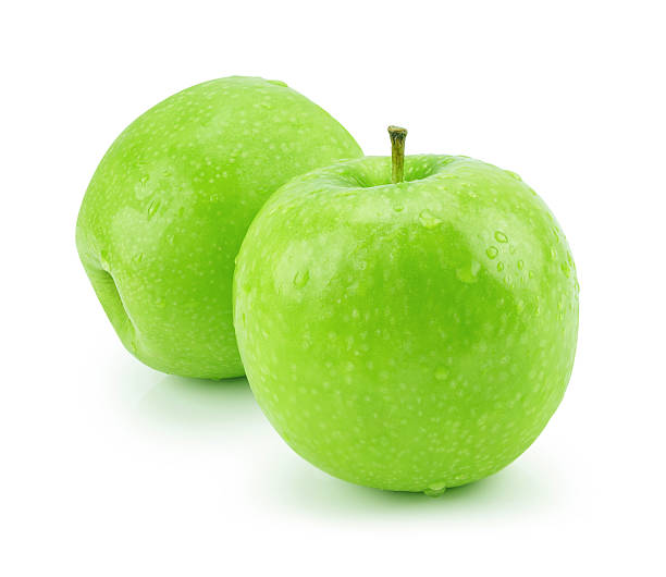 istock Isolated green apple with water drops (white background). Fresh 475724194