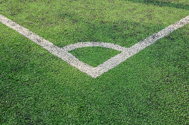 istock Artificial turf soccer field, a corner marker line 475726092