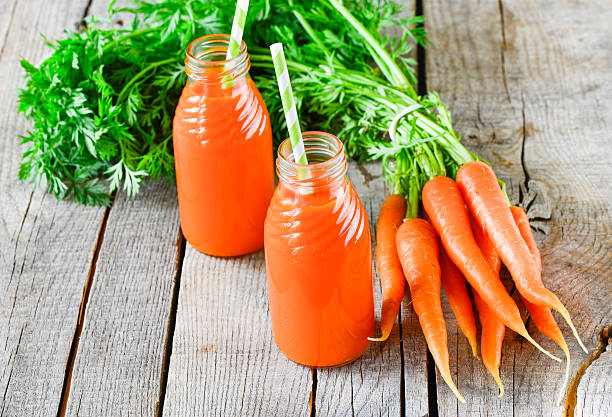 istock Carrots and carrots juice 475726248