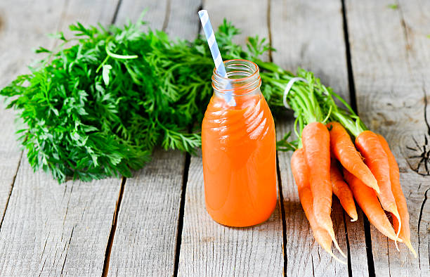 istock Carrots and carrots juice 475726890