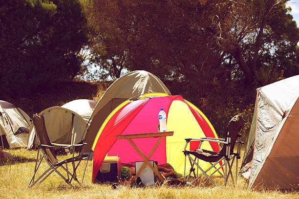 istock Group of tents with chairs and table 475728460