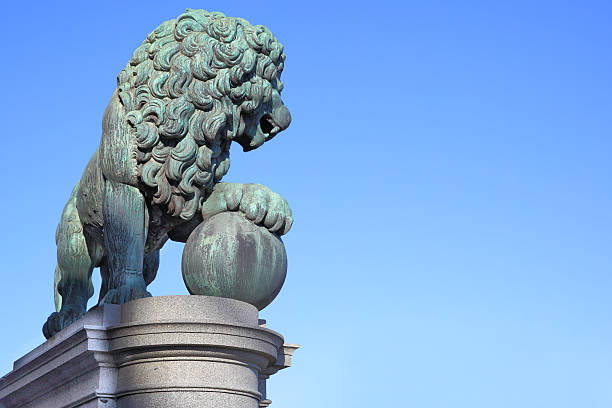Figure of a lion near the Royal Palace in Stockholm with copyspace